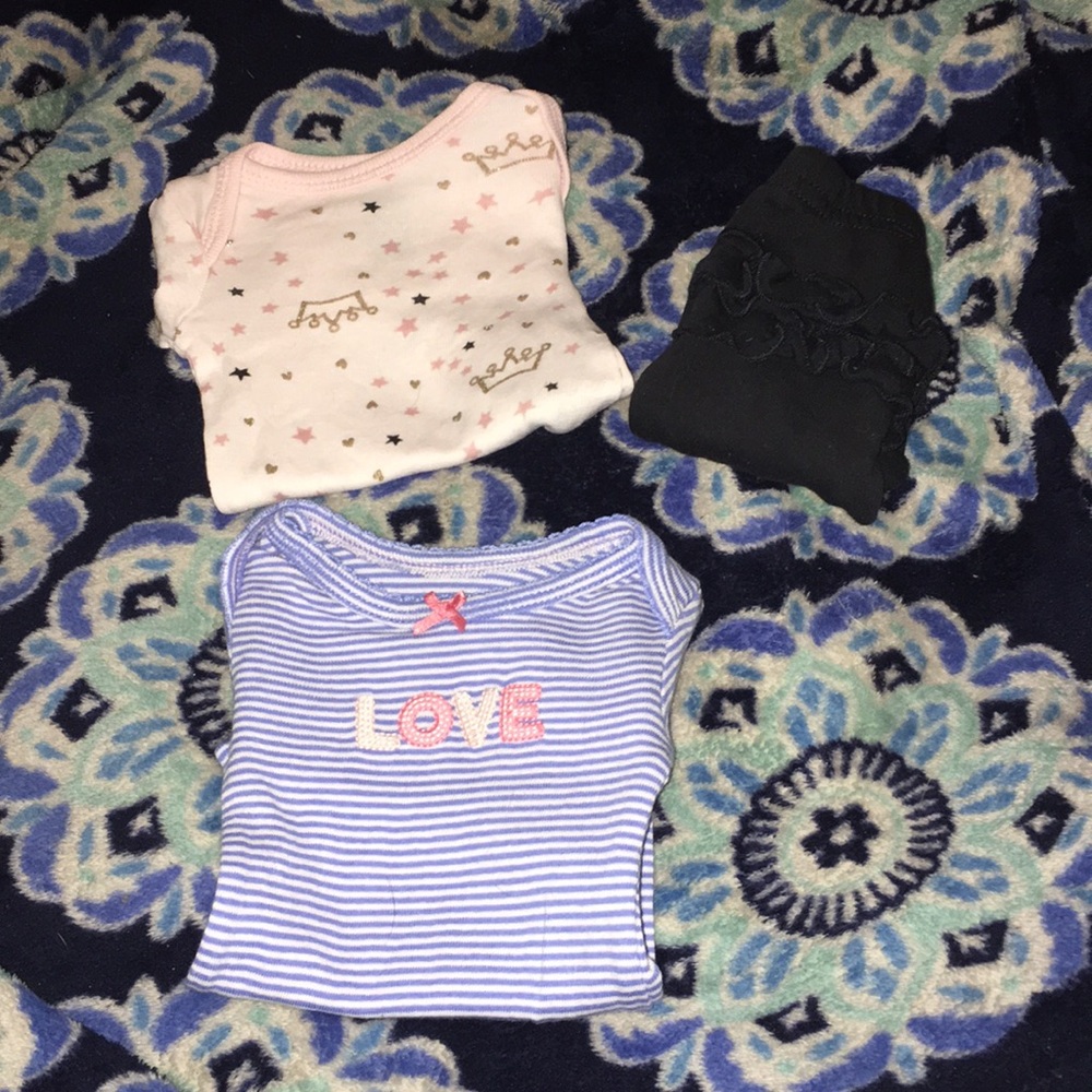 2 body suits and a pair of leggings